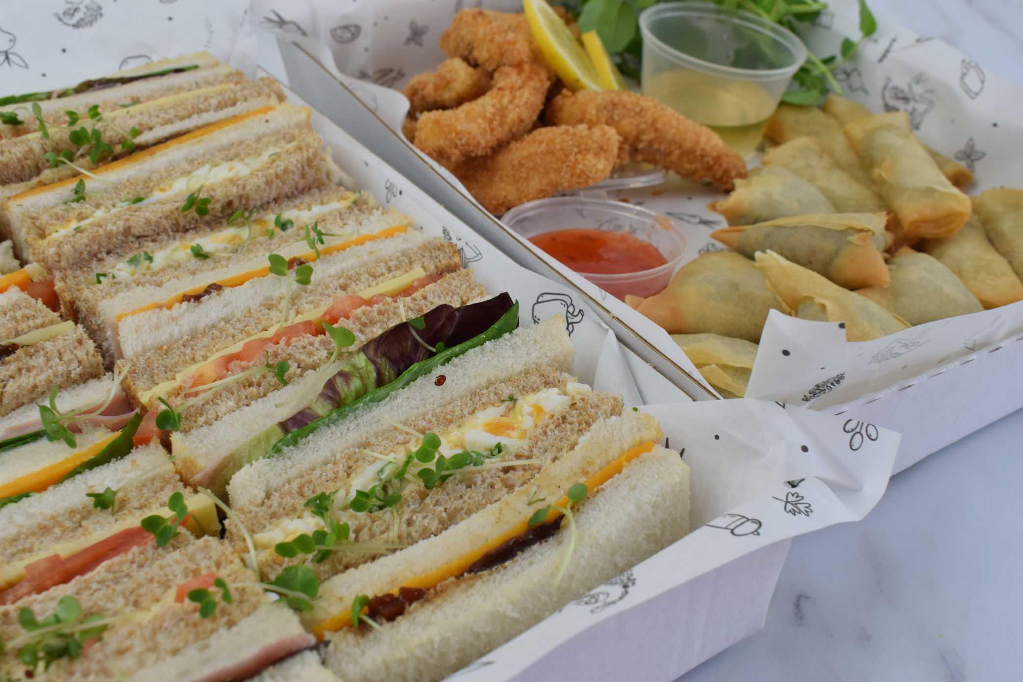 Sandwich platter with savoury bites